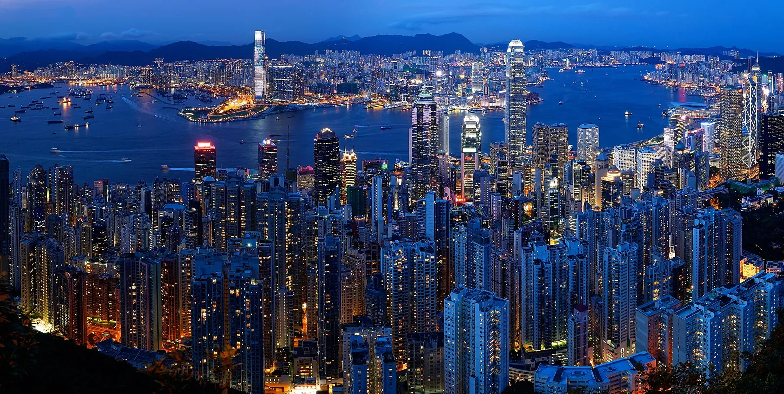 Hong Kong's skyline and Victoria Harbour at dusk seen from the Peak