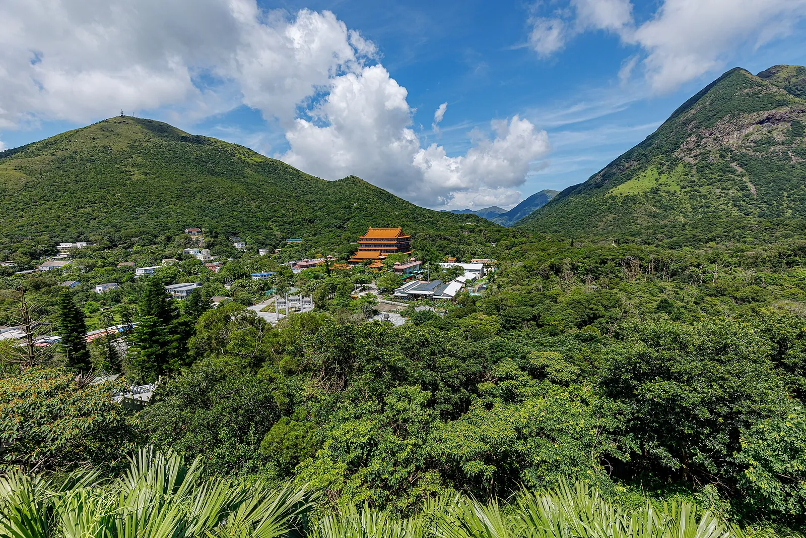 Po Lin Monastery below green Lantau hills