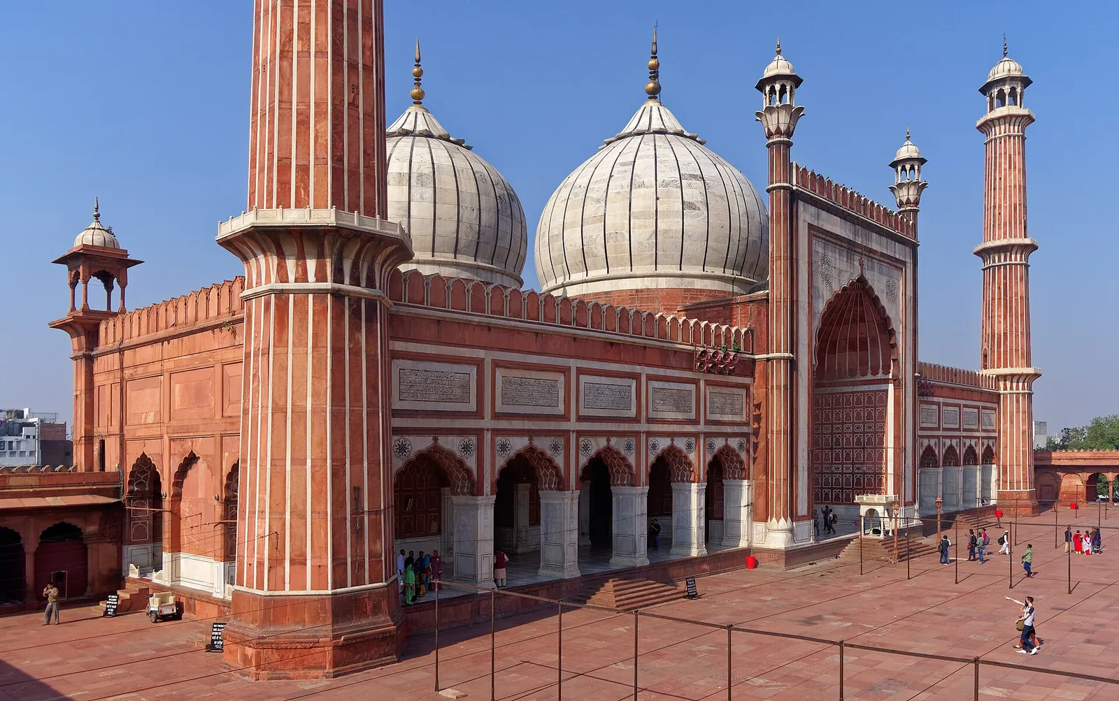 Red sandstone minarets and marble domes of Jama Masjid in Old Delhi