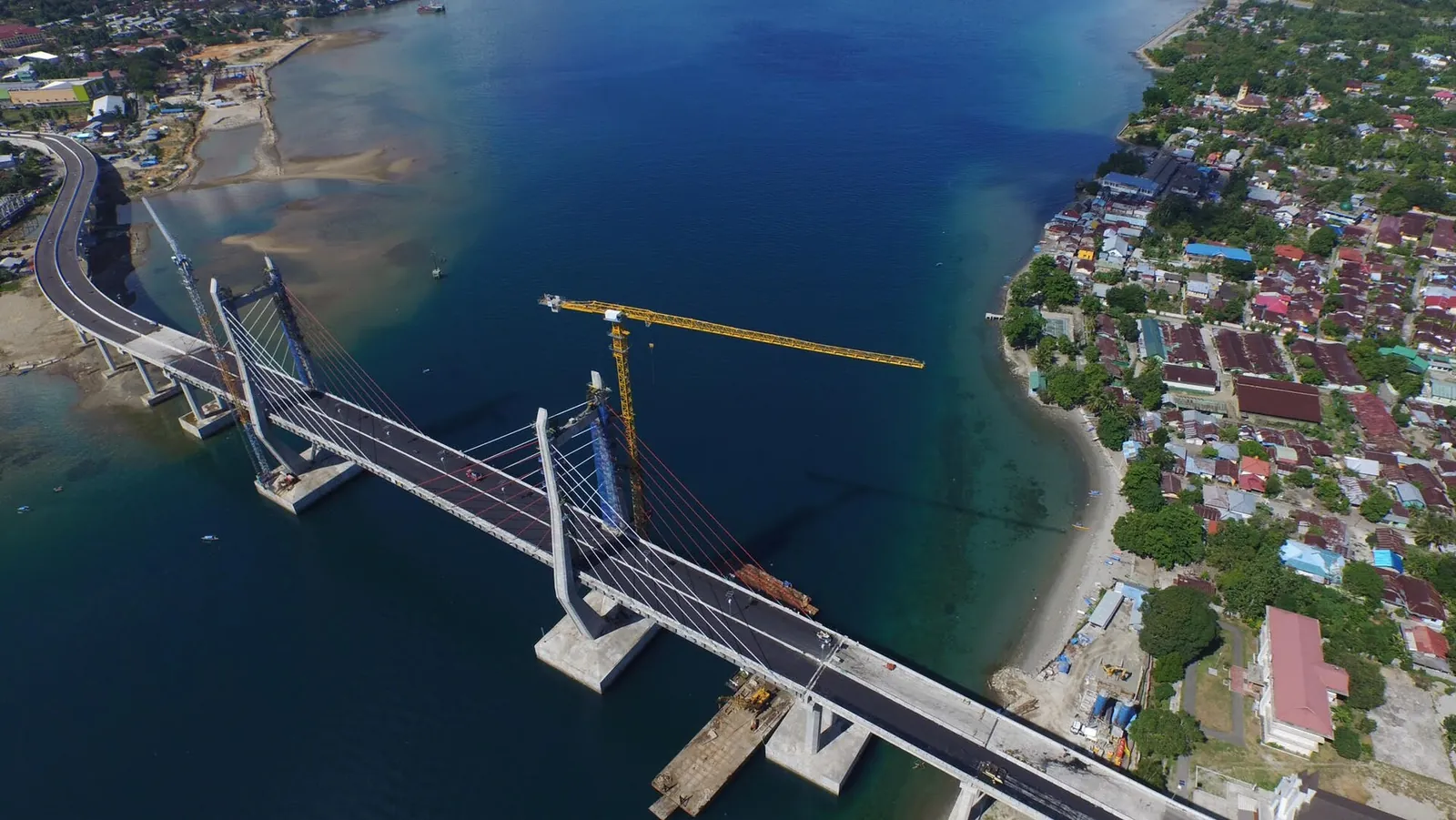 Aerial view of the Merah Putih cable-stayed bridge crossing the inner part of Ambon Bay