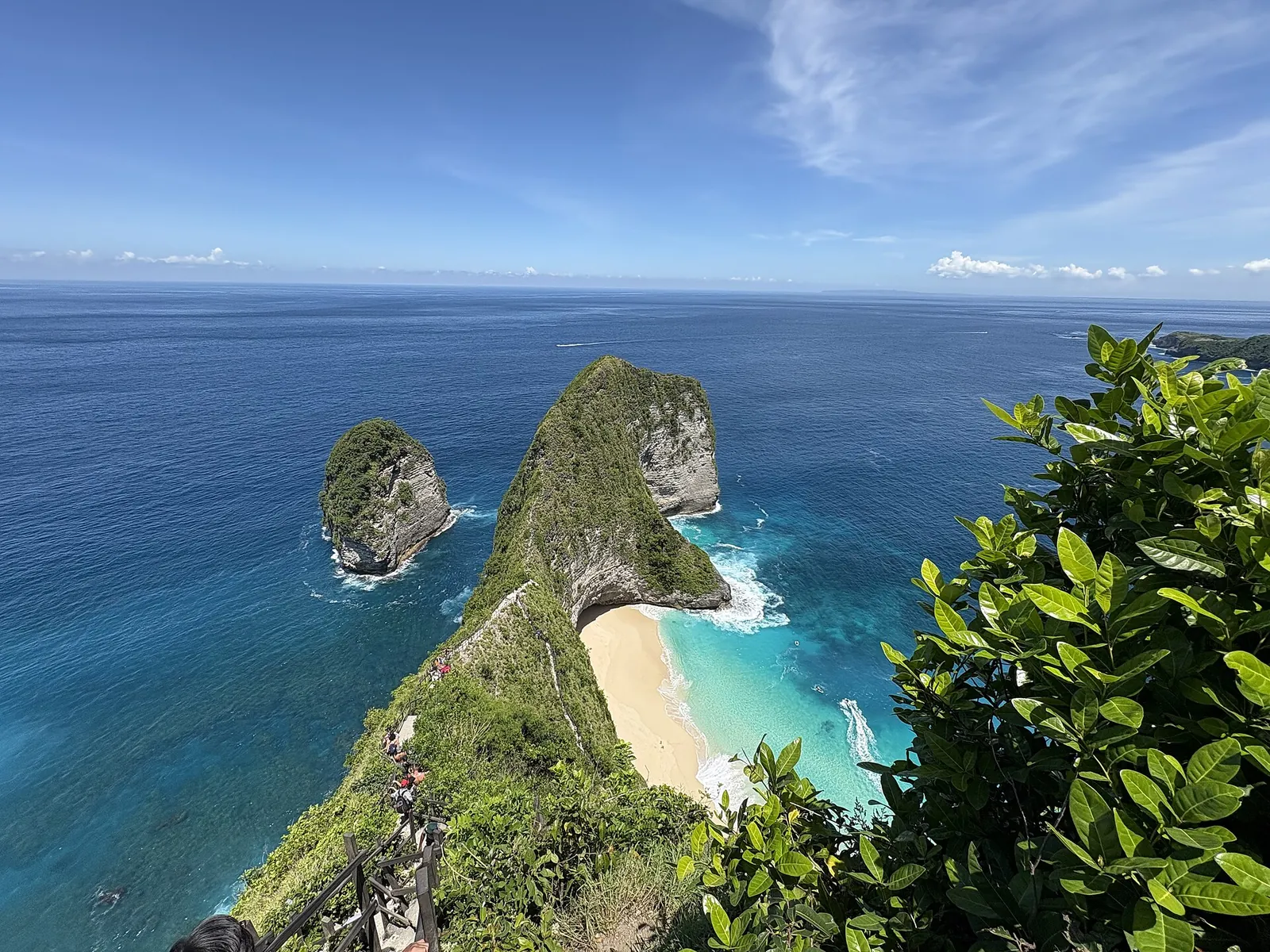 Kelingking Beach cliff on Nusa Penida above turquoise water