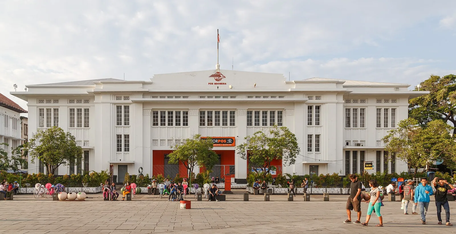 The white colonial Jakarta Kota post office building facing Fatahillah Square
