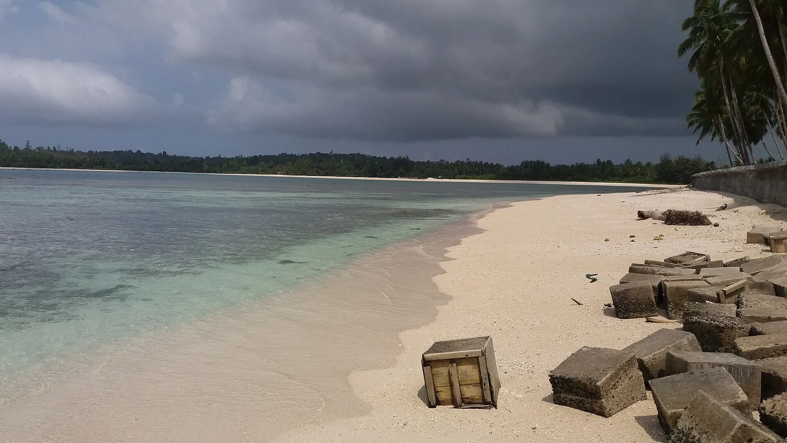 White sand and clear shallow water at Pantai Jati near Tuapejat on Sipora