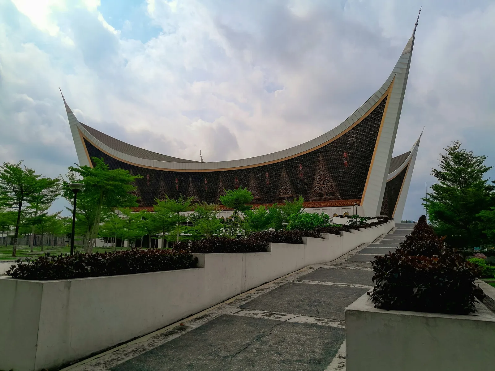 The Grand Mosque of West Sumatra in Padang with its sweeping roof shaped like the spires of a Minangkabau house