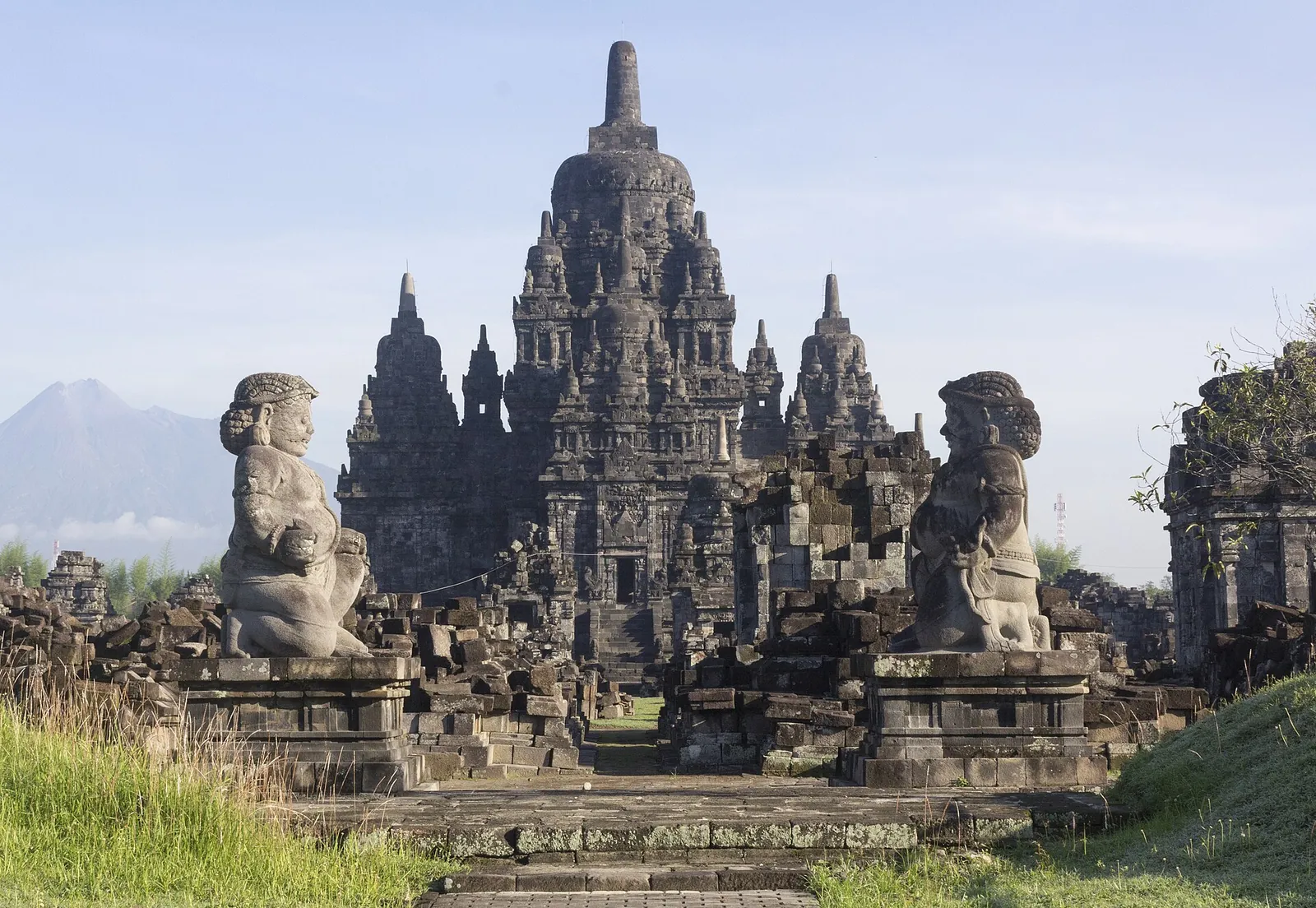 Two guardian statues in front of the main shrine of Candi Sewu