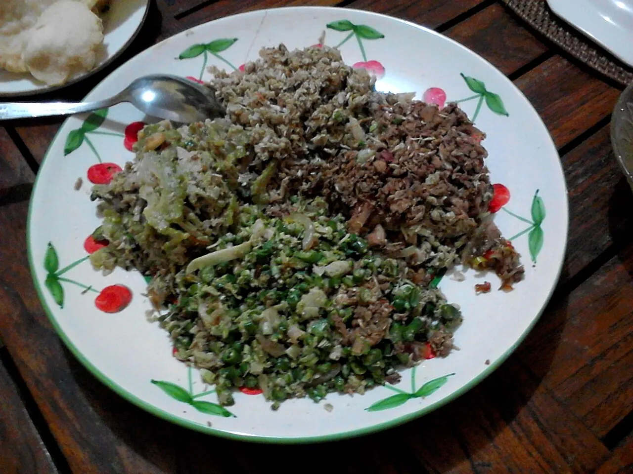 A plate of lawar, finely chopped meat and vegetables mixed with grated coconut and spices