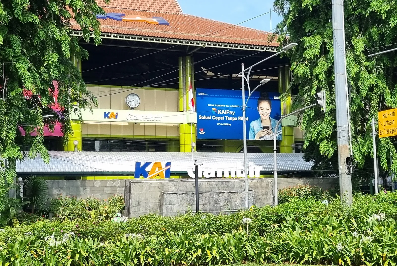 Large KAI Gambir letters in a planted garden in front of Gambir railway station, Jakarta