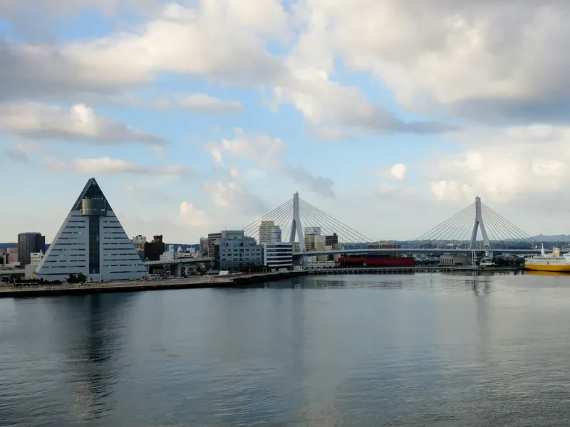 The seafront of Aomori with the ASPAM building and the bay bridge.