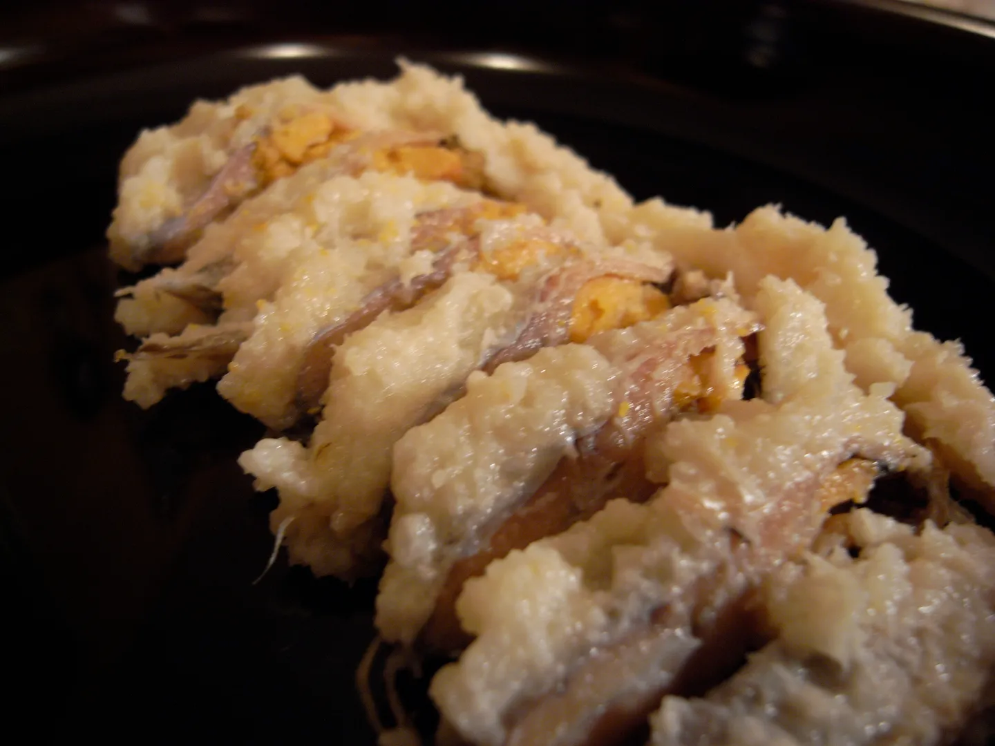 Skiver af funazushi med fermenteret ris, der illustrerer en Shiga-specialitet.