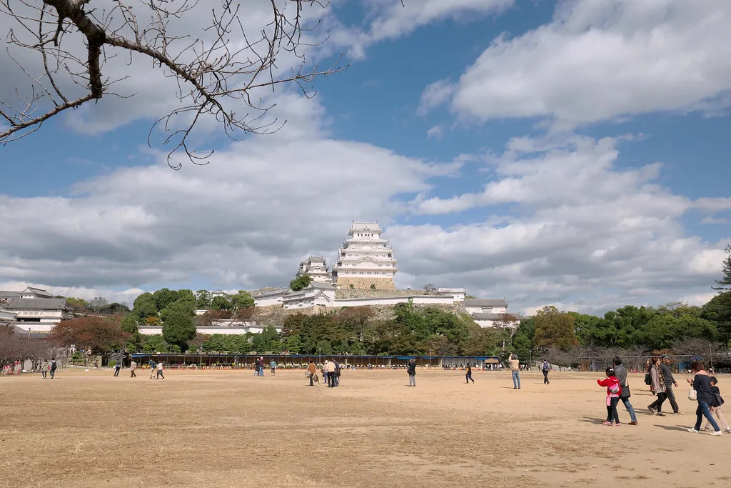 Himeji Castle and visitors in its grounds.