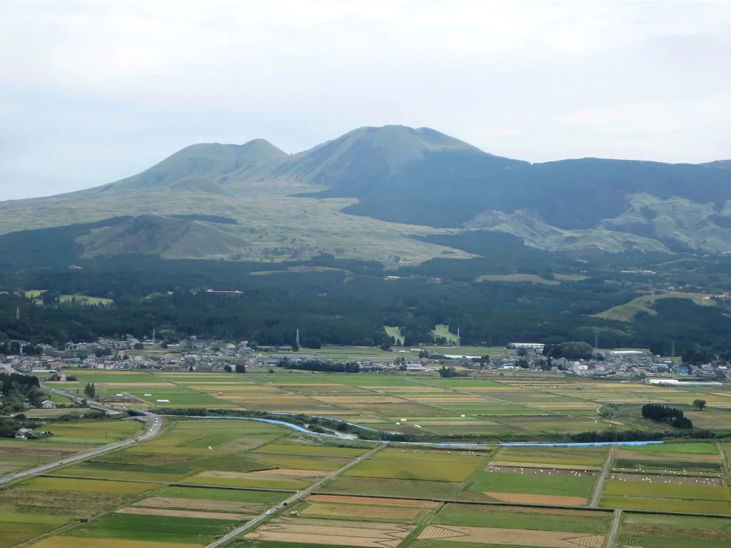 View of Mount Aso over the cultivated fields of the caldera in Kumamoto.