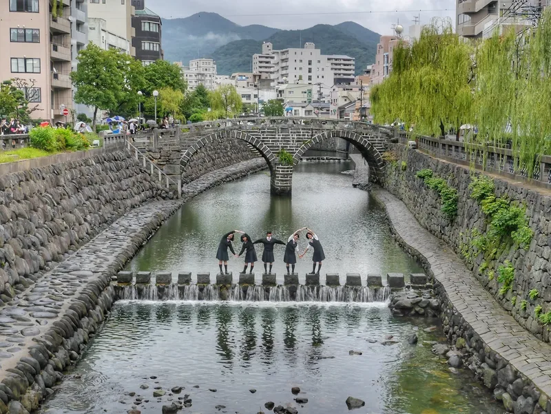 Meganebashi, the two-arched Spectacles Bridge, reflected in the river in Nagasaki.