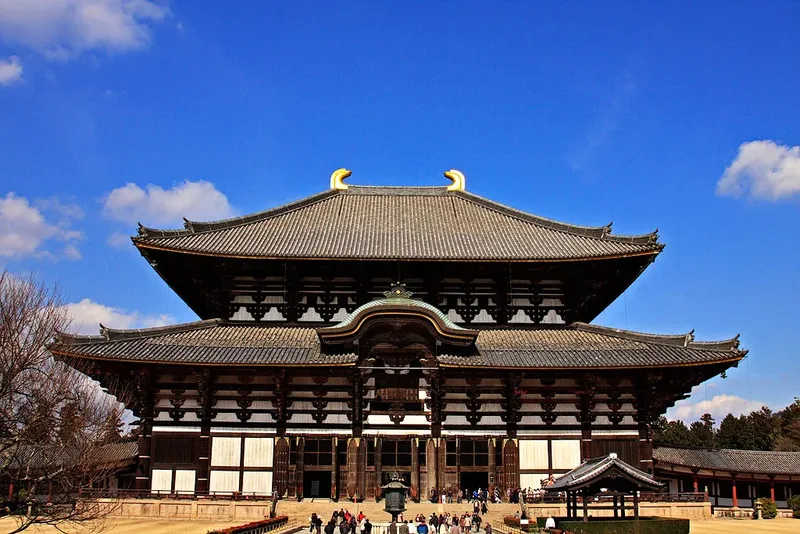 Todaiji's Daibutsuden hall in Nara under a blue sky.