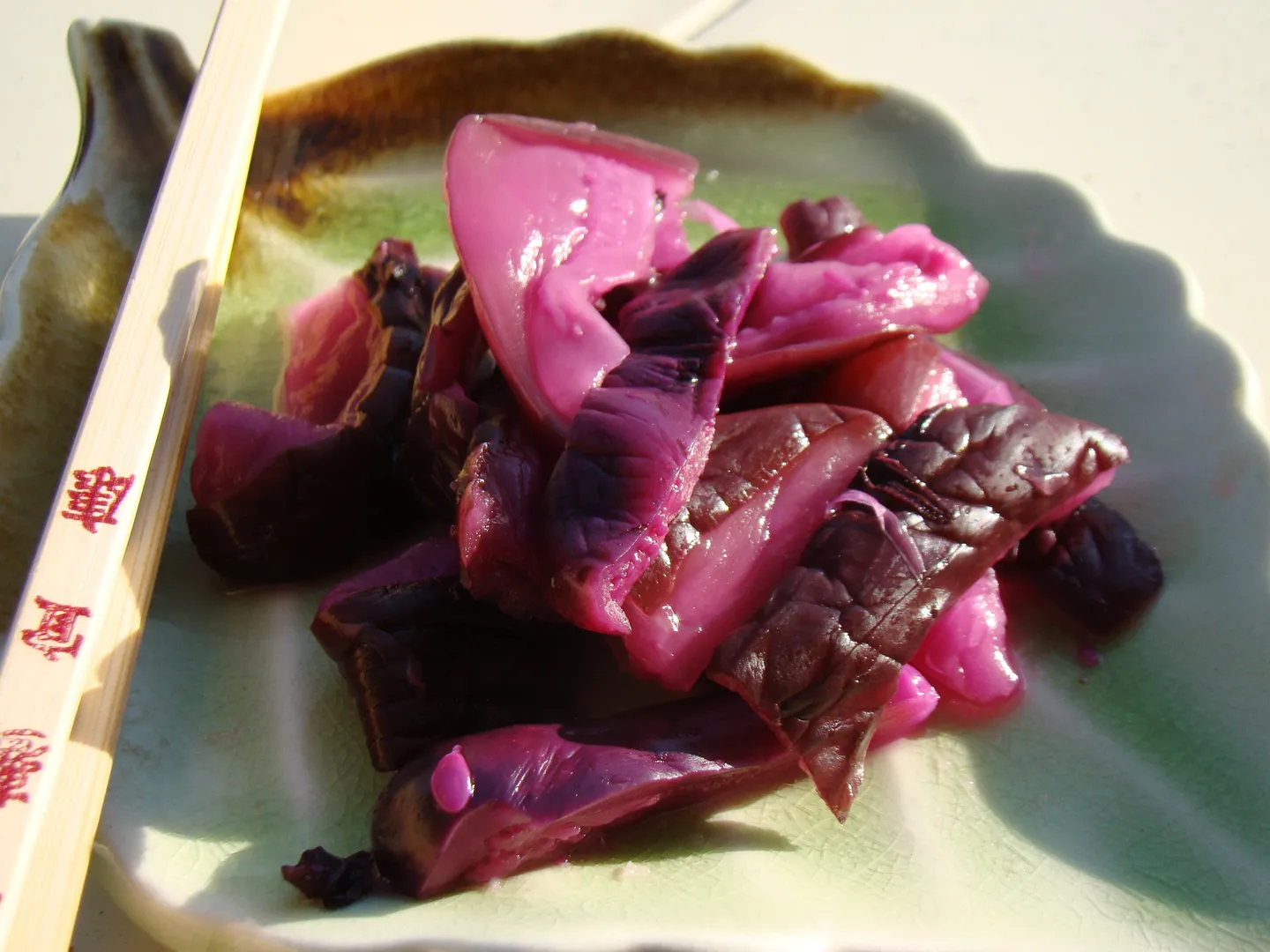A serving of purple shibazuke pickles, associated with Ohara and Kyoto.