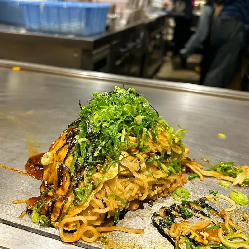 Hiroshima-style okonomiyaki prepared in layers.
