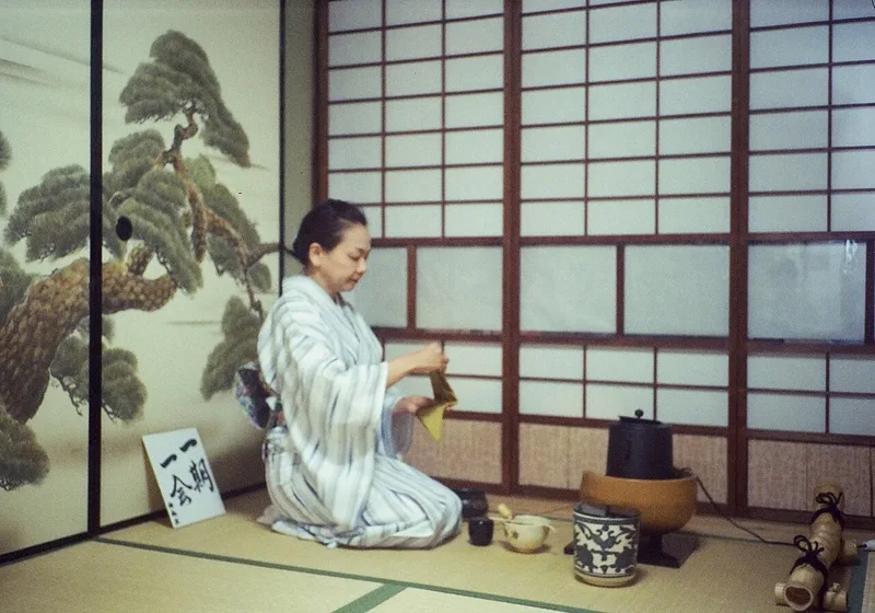 A host preparing tea at a Kyoto tea ceremony