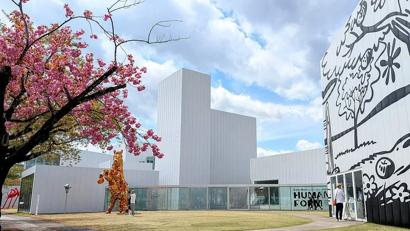 Towada Art Center with cherry blossoms