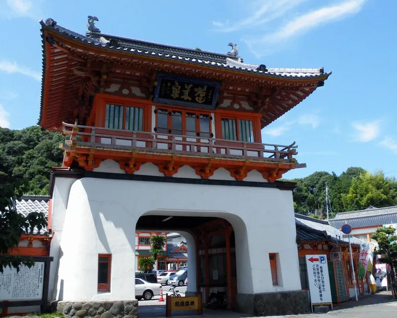 The red-and-white Romon gate at Takeo Onsen