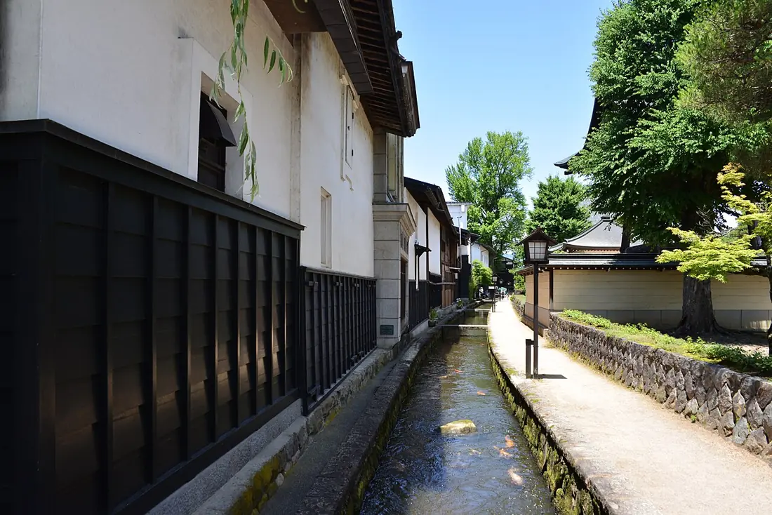 Summer greenery and the Setogawa canal in Hida Furukawa.