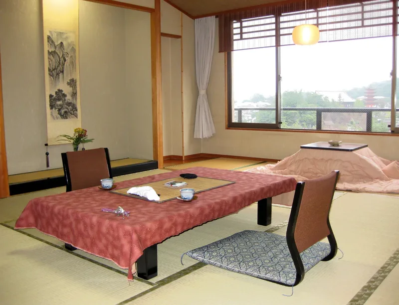 A tatami room with a low table at Jukeiso ryokan on Miyajima.