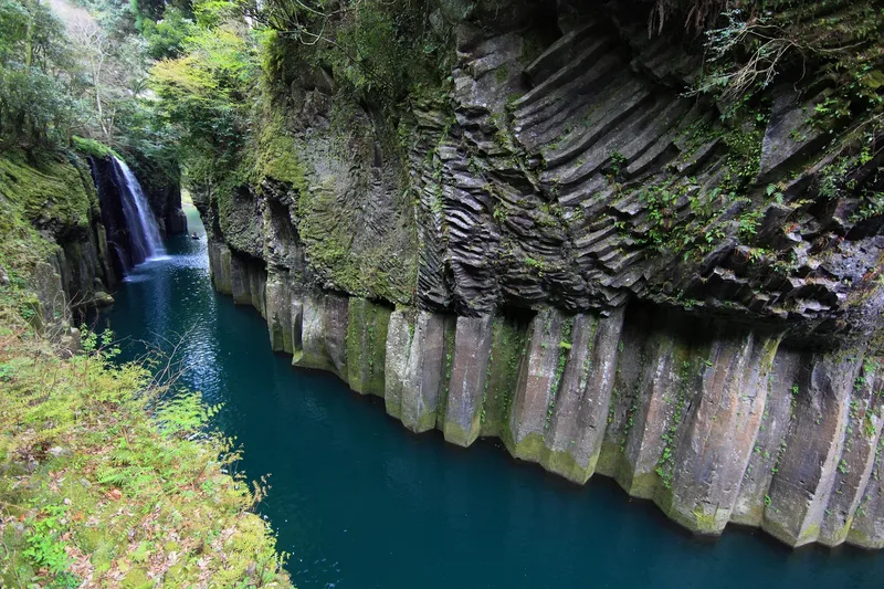 Manai Falls and columnar basalt walls in Takachiho Gorge, Miyazaki.
