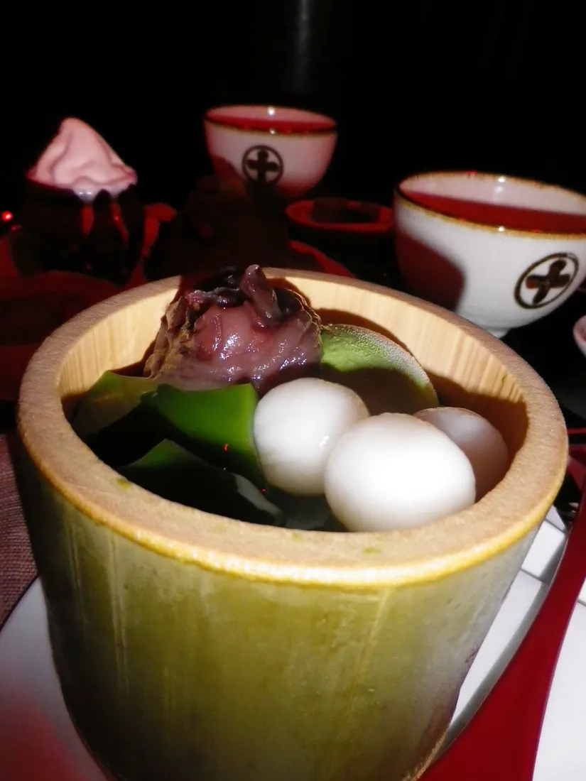 A matcha dessert with sweet beans and white dumplings, photographed in Uji.
