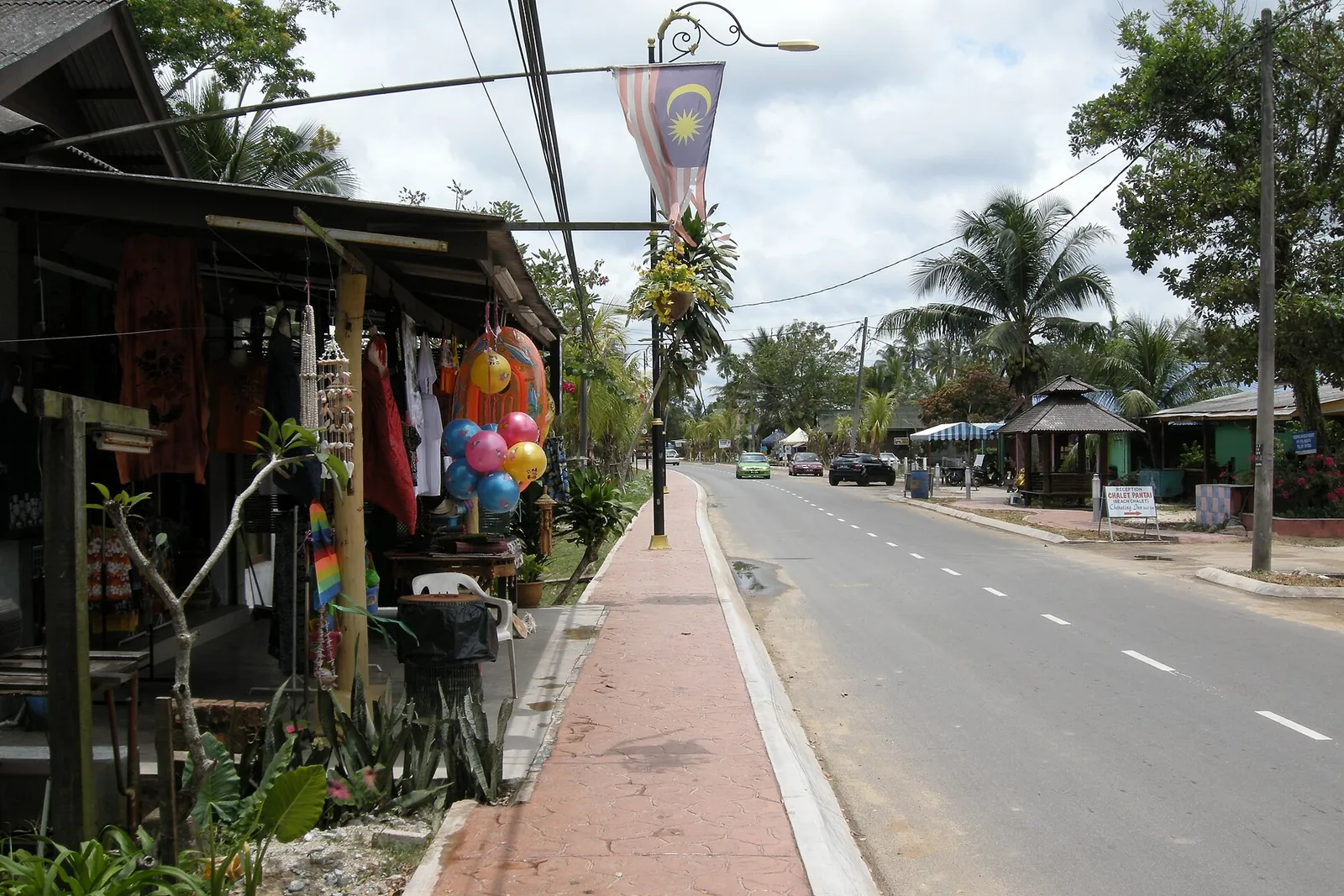 Shops beside a road in Cherating village