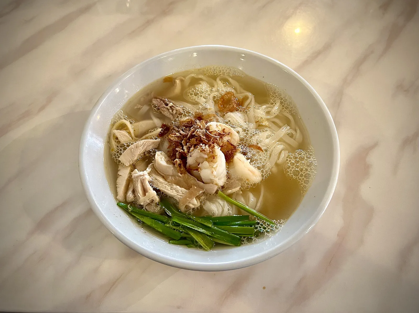 Bowl of Ipoh hor fun noodles photographed in Ipoh