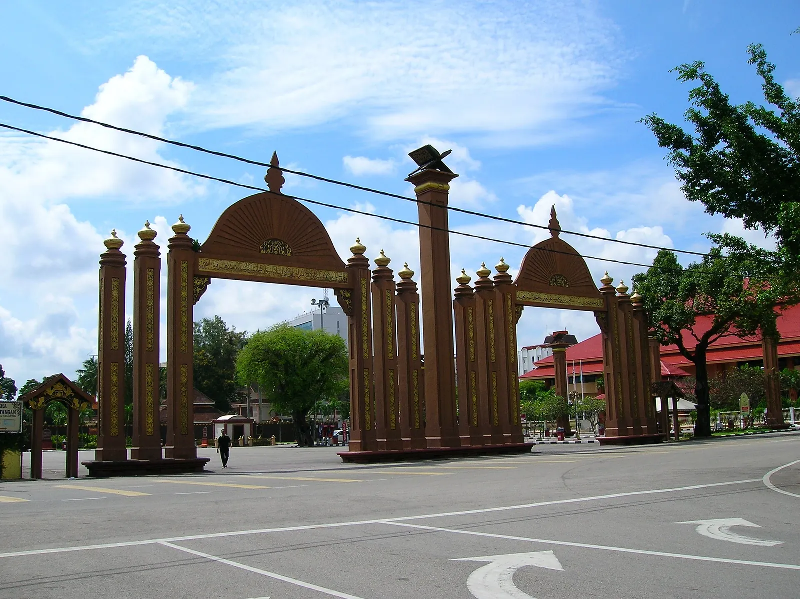 Decorative gateway at Istana Jahar in Kota Bharu under a blue sky