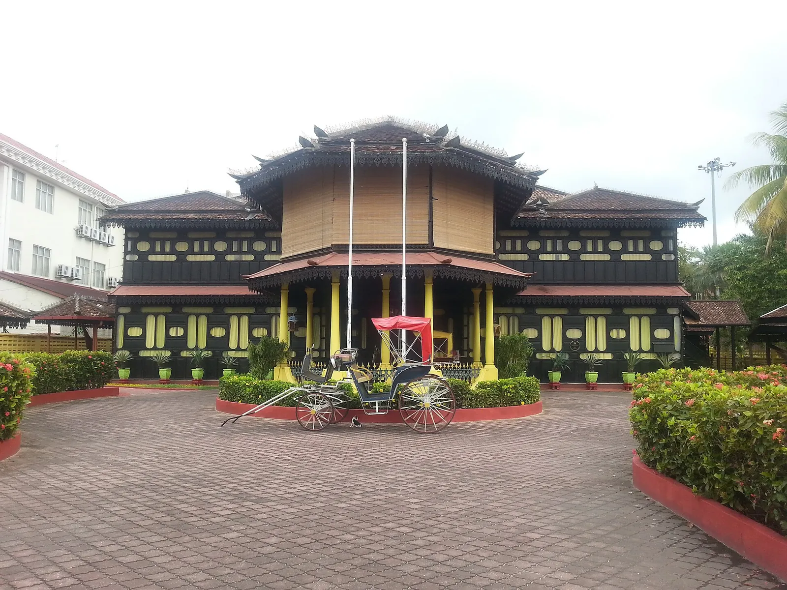 Traditional wooden Istana Jahar building and gardens in Kota Bharu