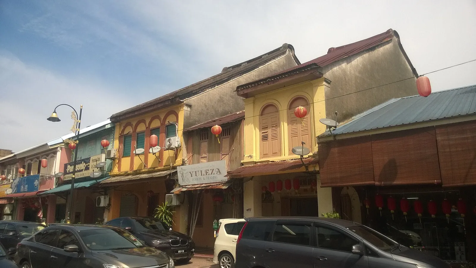 Colorful shopfronts along a Chinatown street in Kuala Terengganu