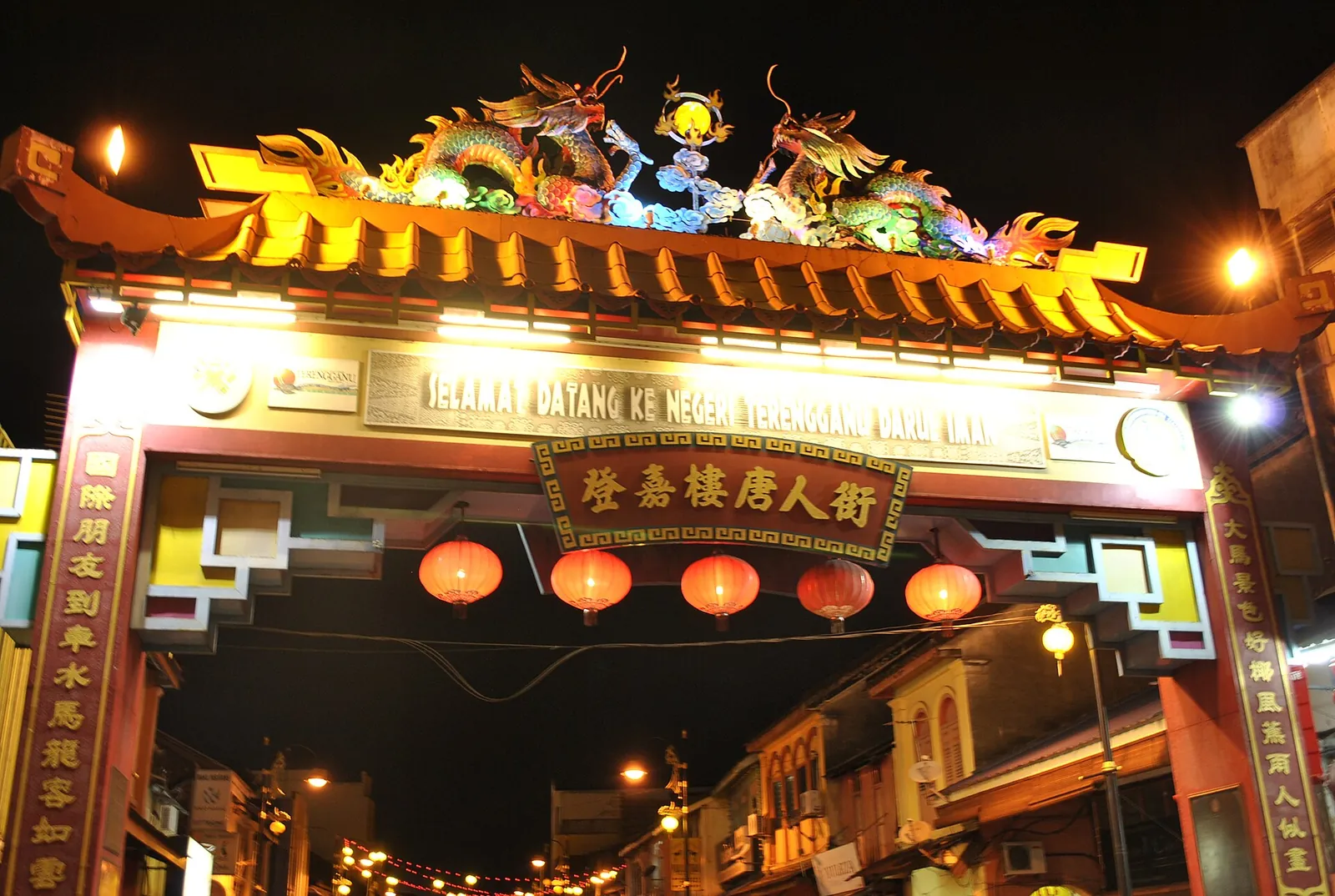 Illuminated colorful Chinatown gateway in Kuala Terengganu at night