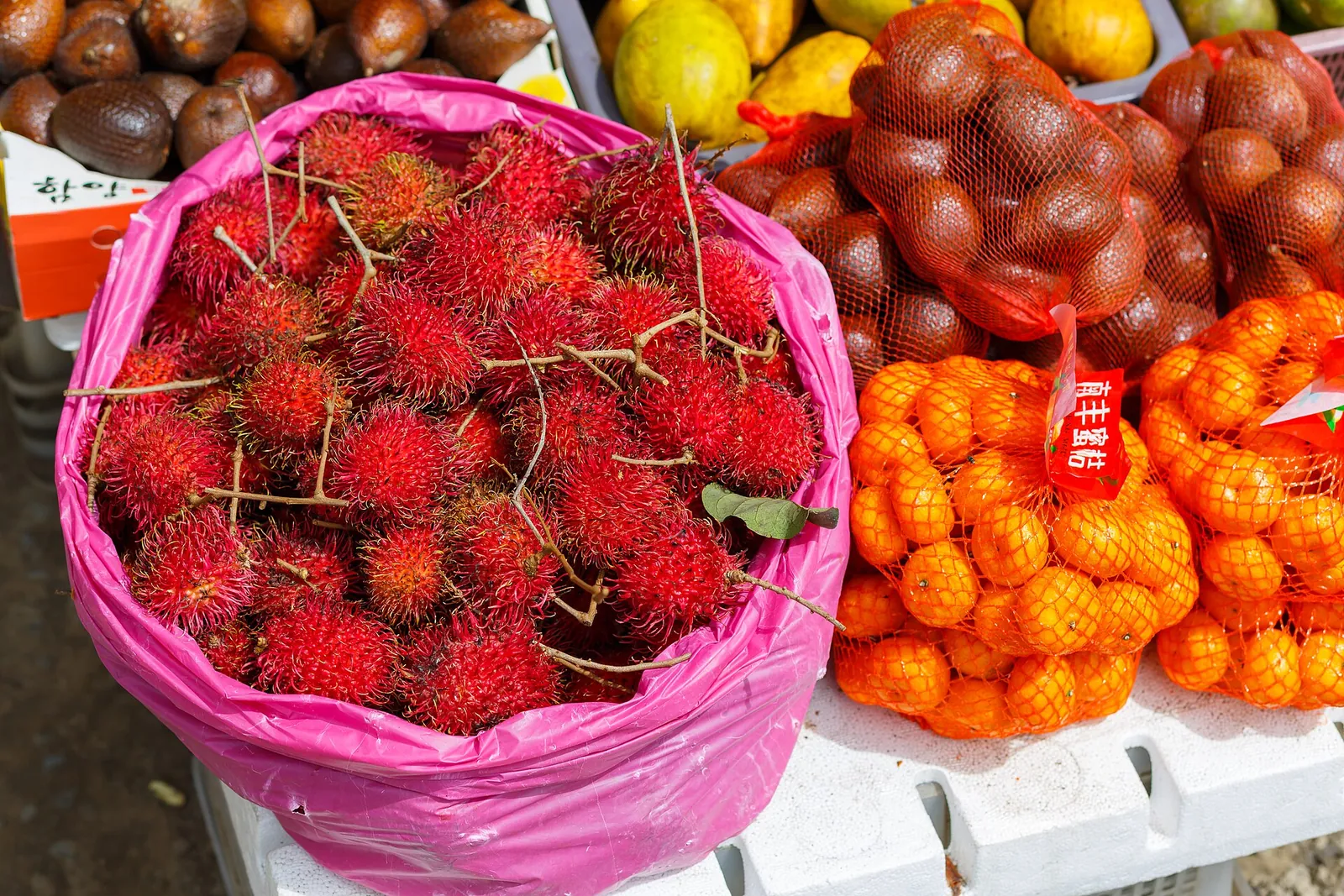 Rambutan and other colourful fruit at Kundasang vegetable market