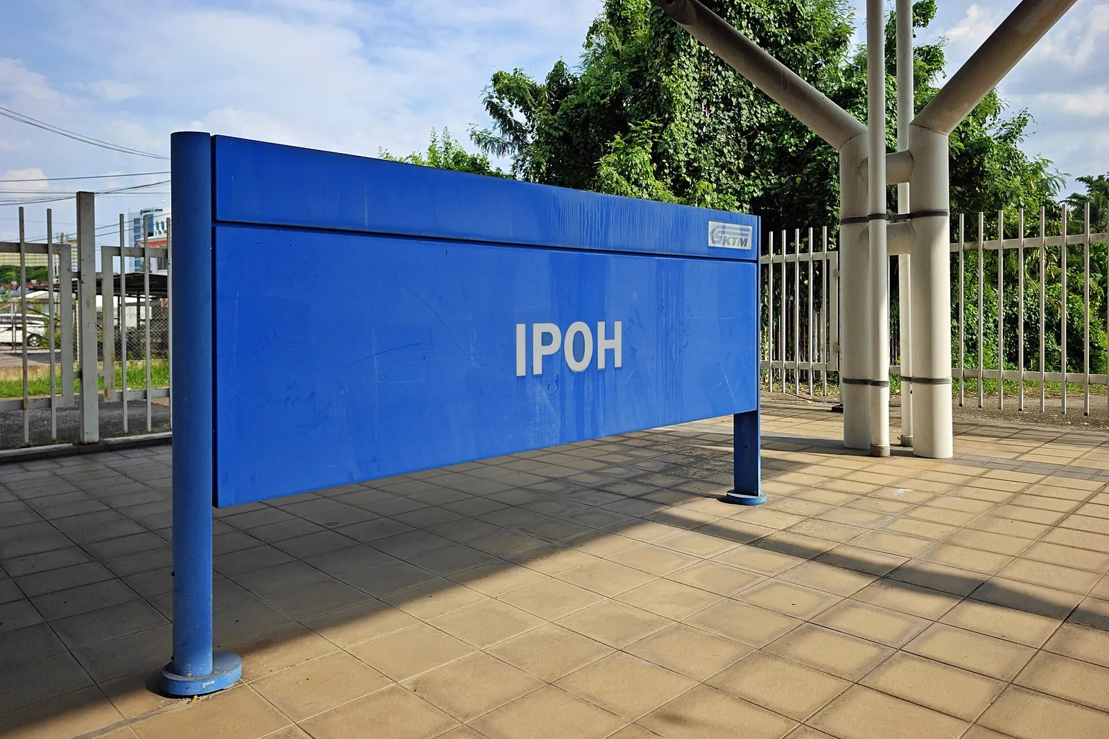 Ipoh railway station platform with station name sign