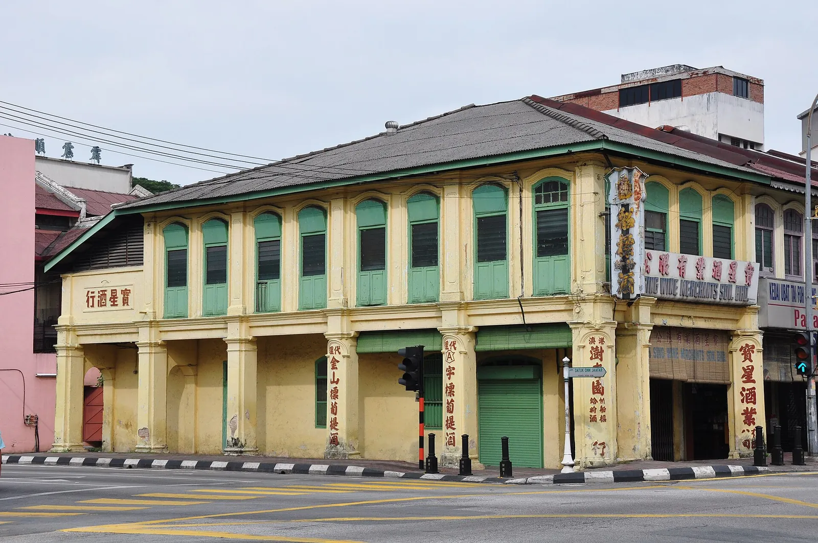 Green and cream heritage building in Ipoh