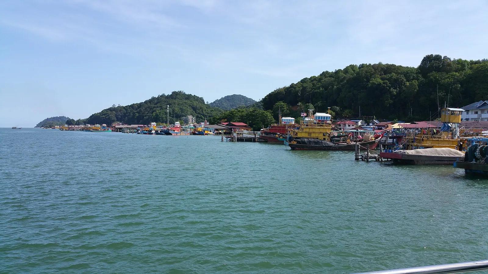 Fishing boats moored along the coast of Pangkor Island