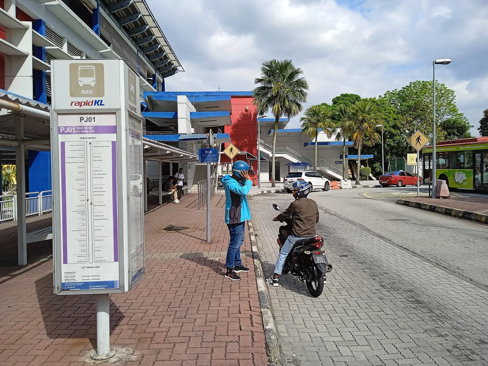 Pedestrians and a bus stop beside Taman Jaya LRT station in Petaling Jaya