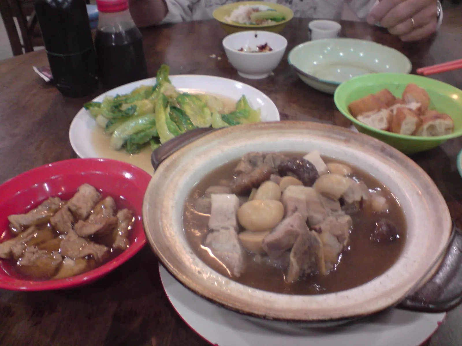 Bak kut teh soup and accompanying dishes on a table in SS2, Petaling Jaya
