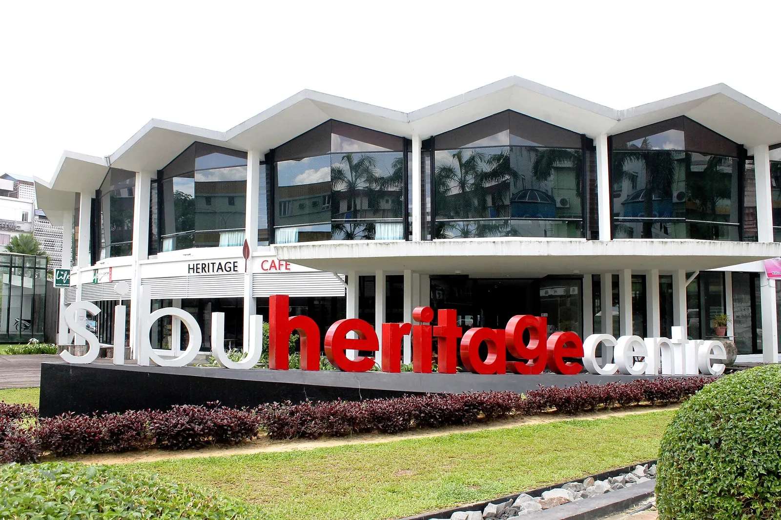 White facade and red lettering of Sibu Heritage Centre