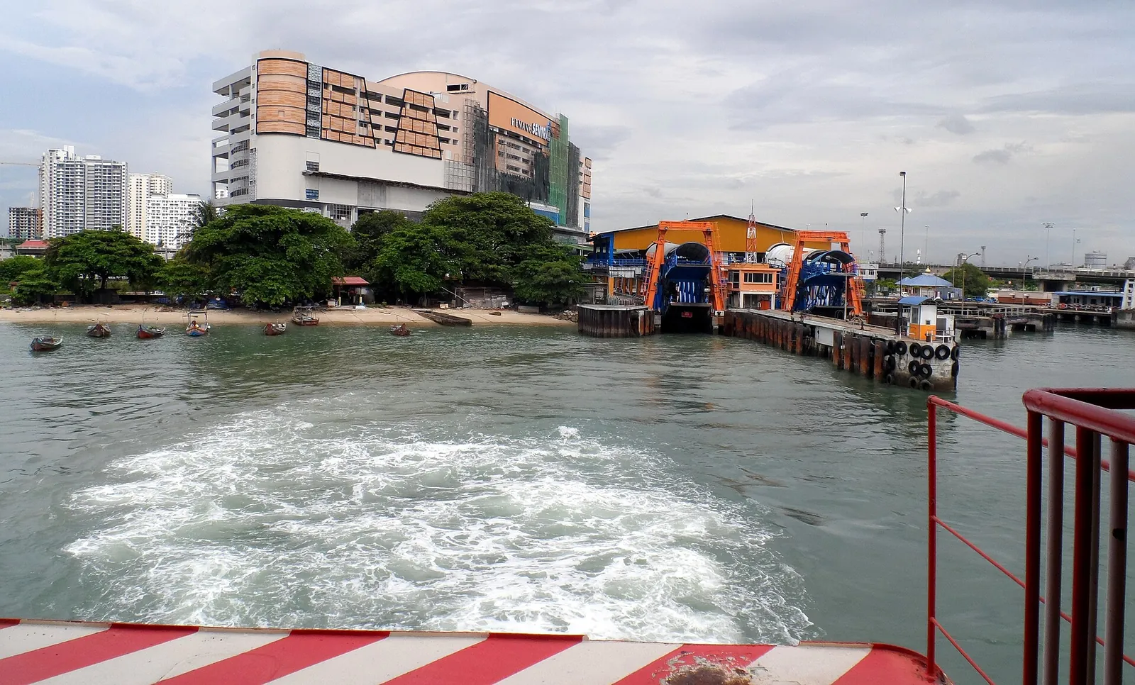 Butterworth ferry terminal and waterfront buildings seen from a ferry