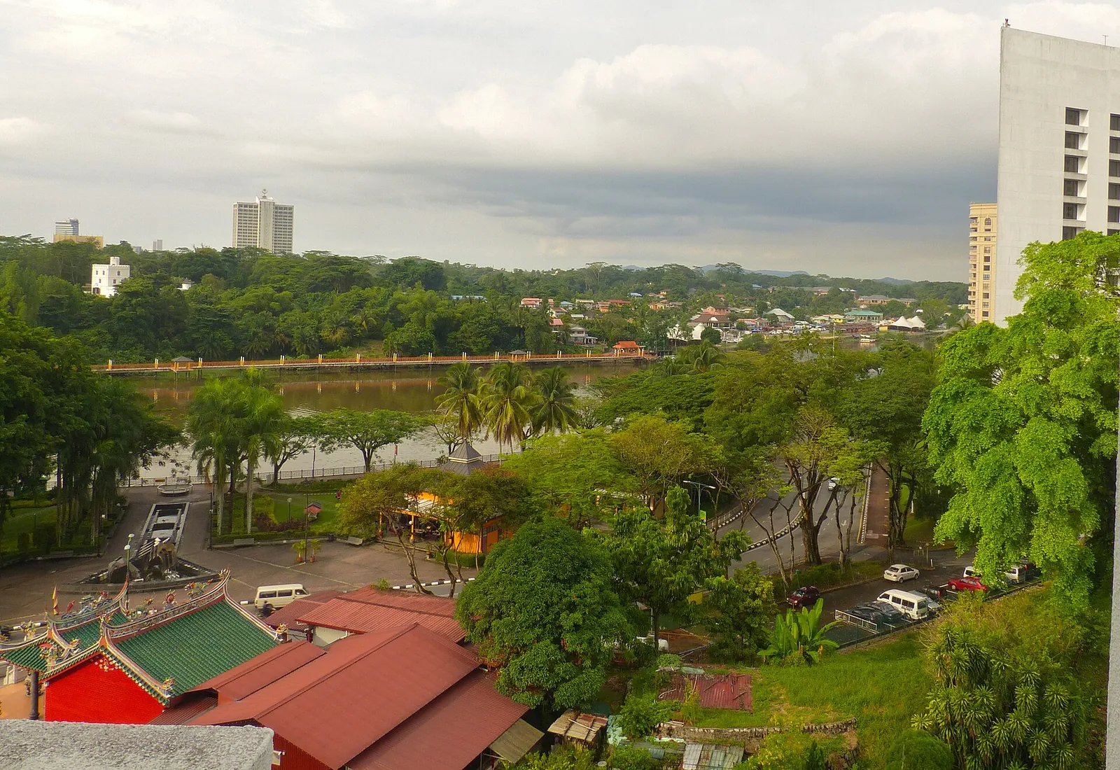 Kuching waterfront and surrounding greenery seen from a hotel