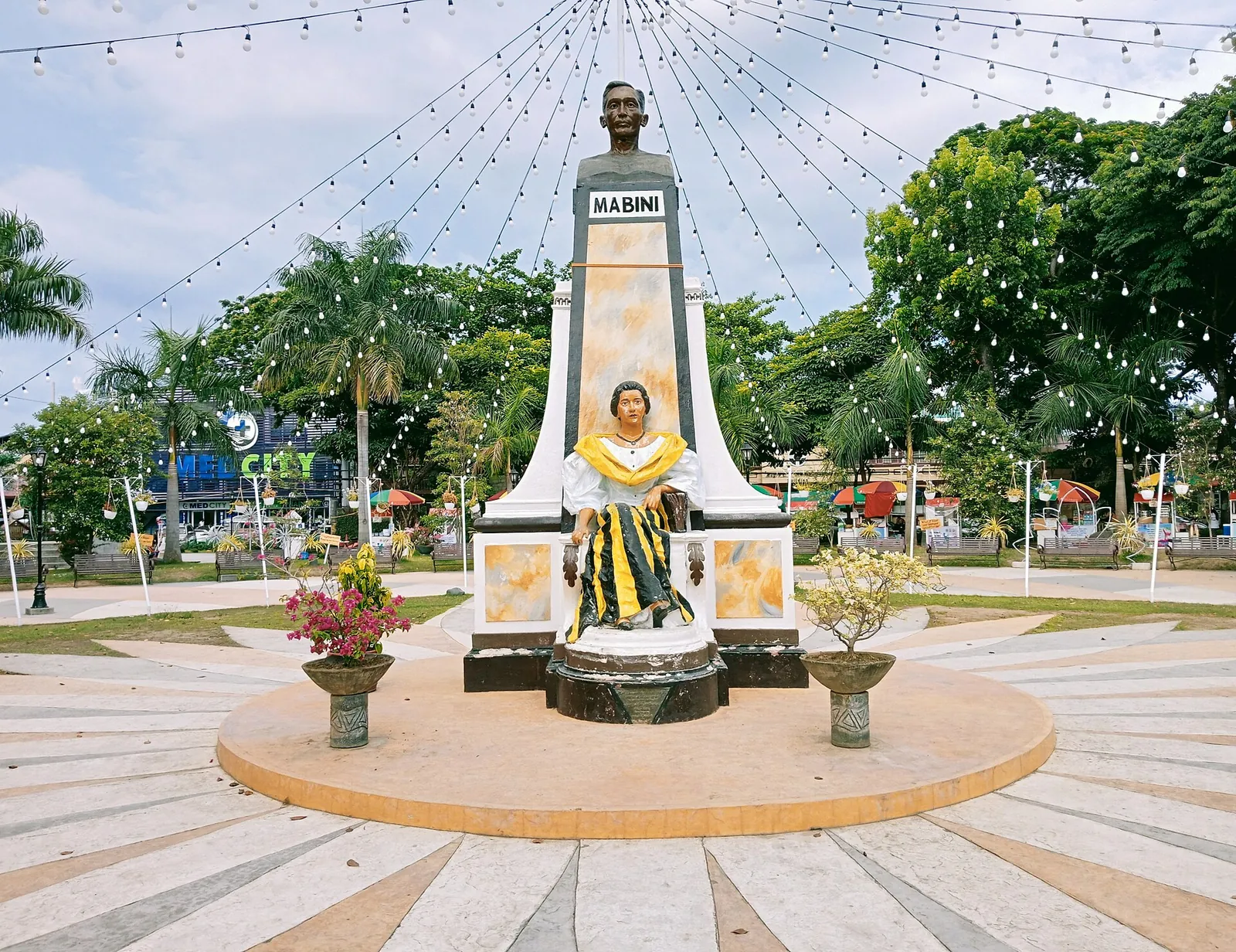 Apolinario Mabini monument and paved paths at Plaza Mabini in Batangas City