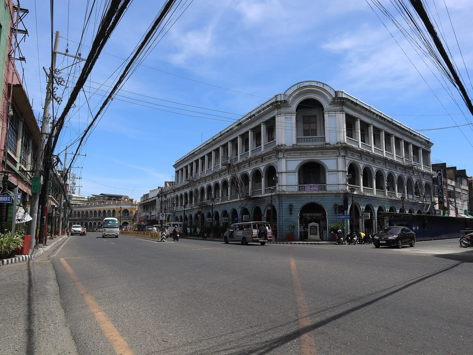 Historic corner building and blue sky at JM Basa and Aldeguer streets in Iloilo City