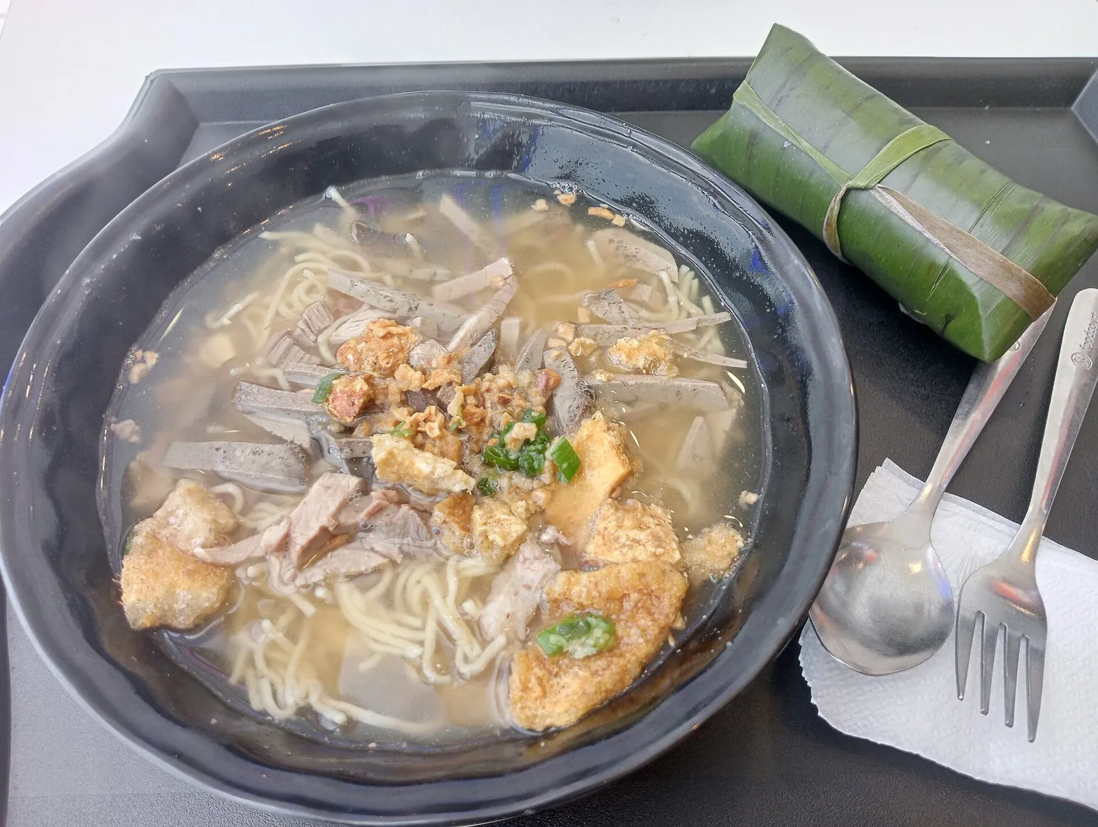 Iloilo batchoy served with puto