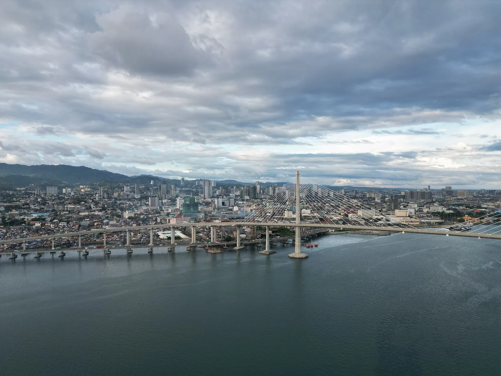 Cebu City skyline and CCLEX bridge across the channel