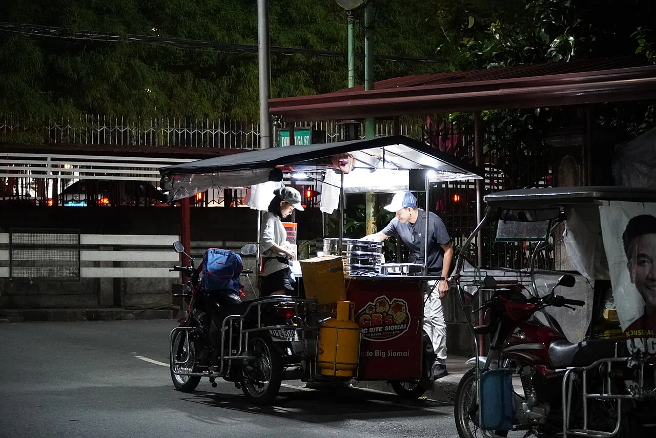 Night-time siomai vendor outside a church in Lipa, Batangas