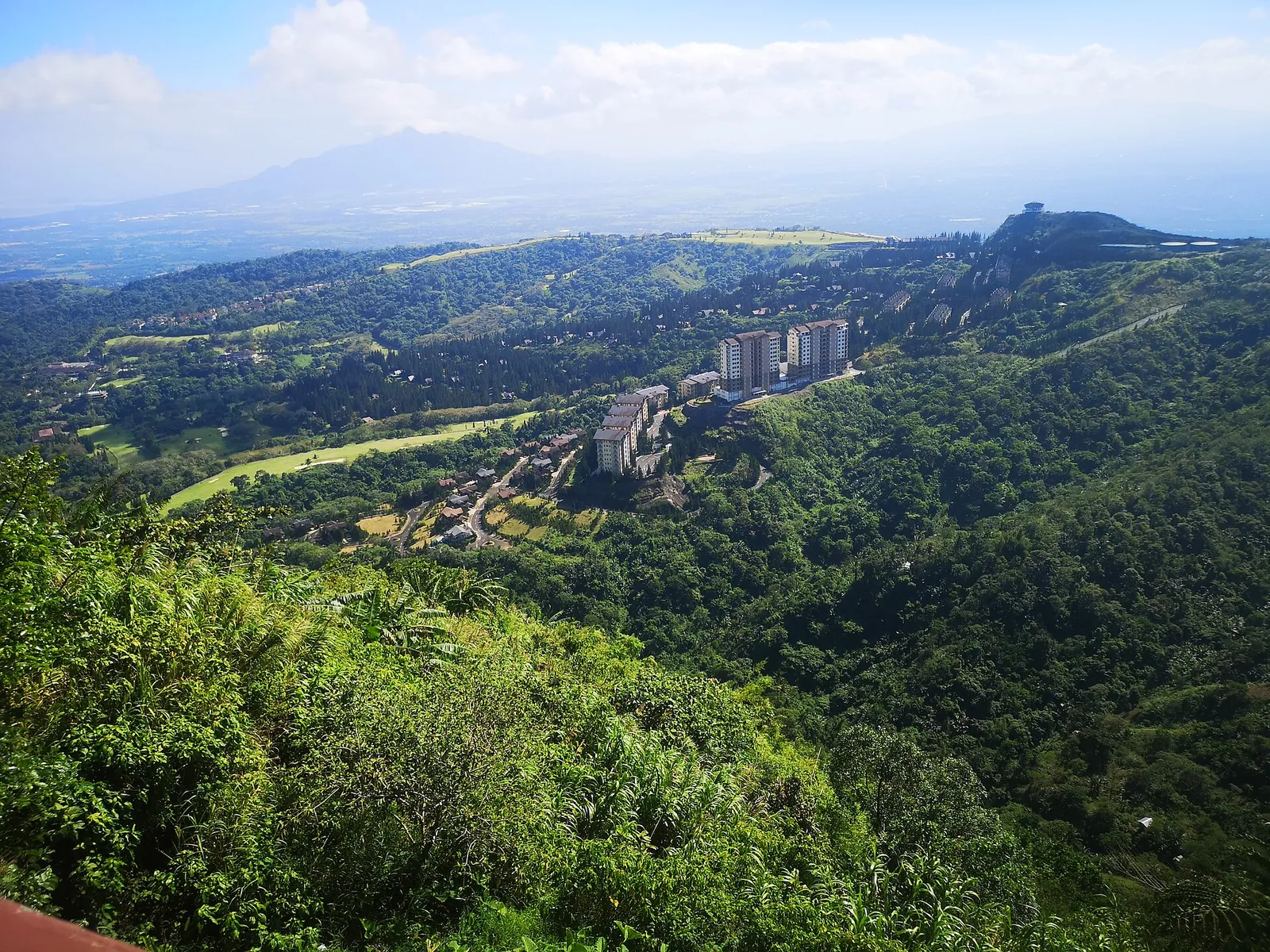 Green hills and buildings viewed from People’s Park in Tagaytay