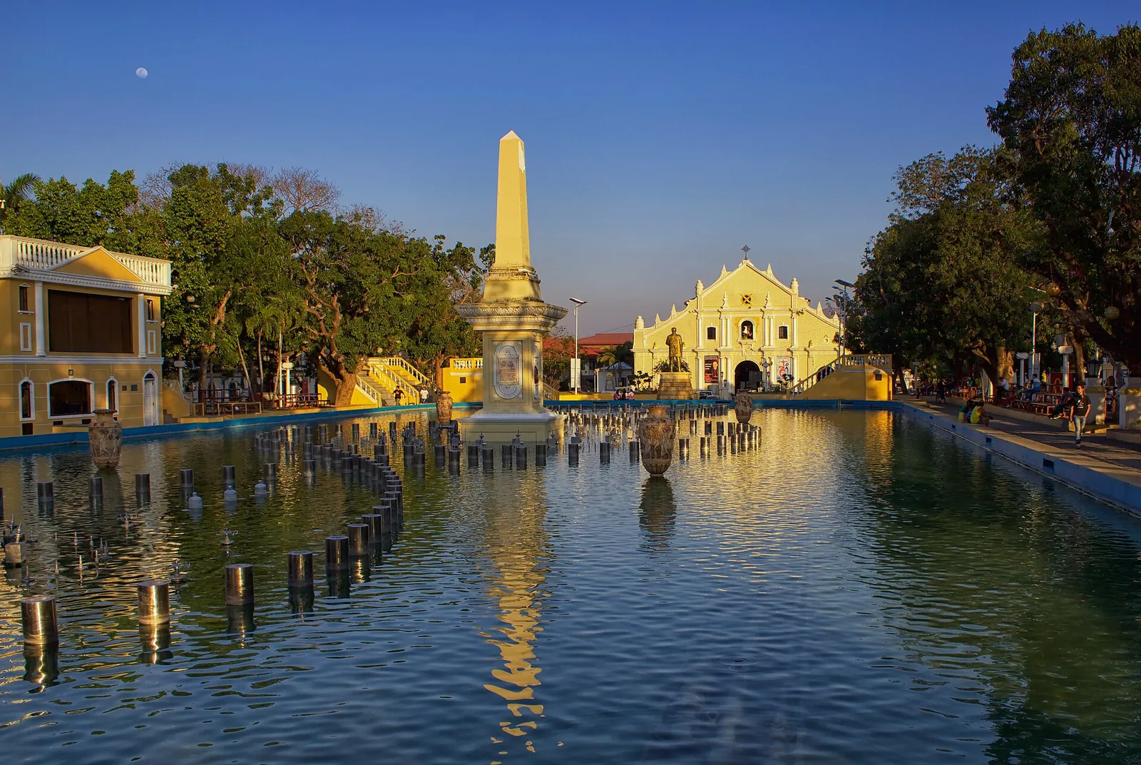 Plaza Salcedo pool and monument with St Paul’s Cathedral behind in Vigan