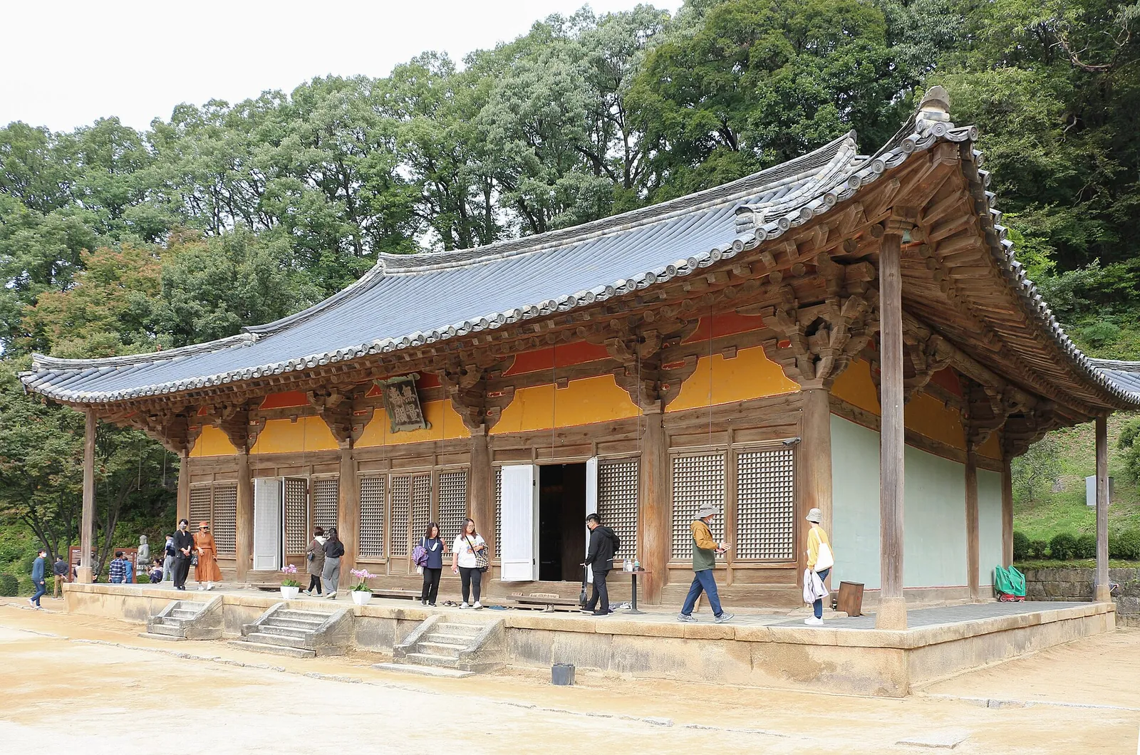 Muryangsujeon Hall at Buseoksa Temple in Yeongju, with visitors on the courtyard in front