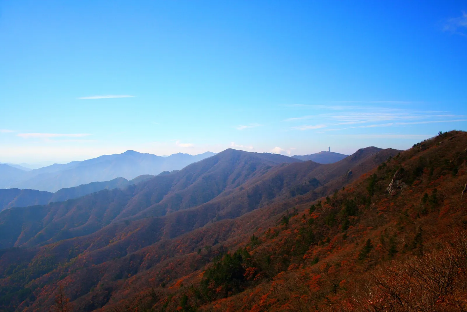 Autumn-coloured ridges of Sobaeksan seen from Birobong under a blue sky
